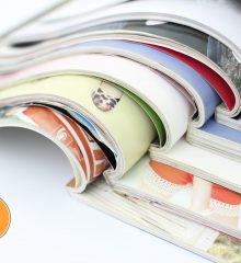 stack of magazines on white background