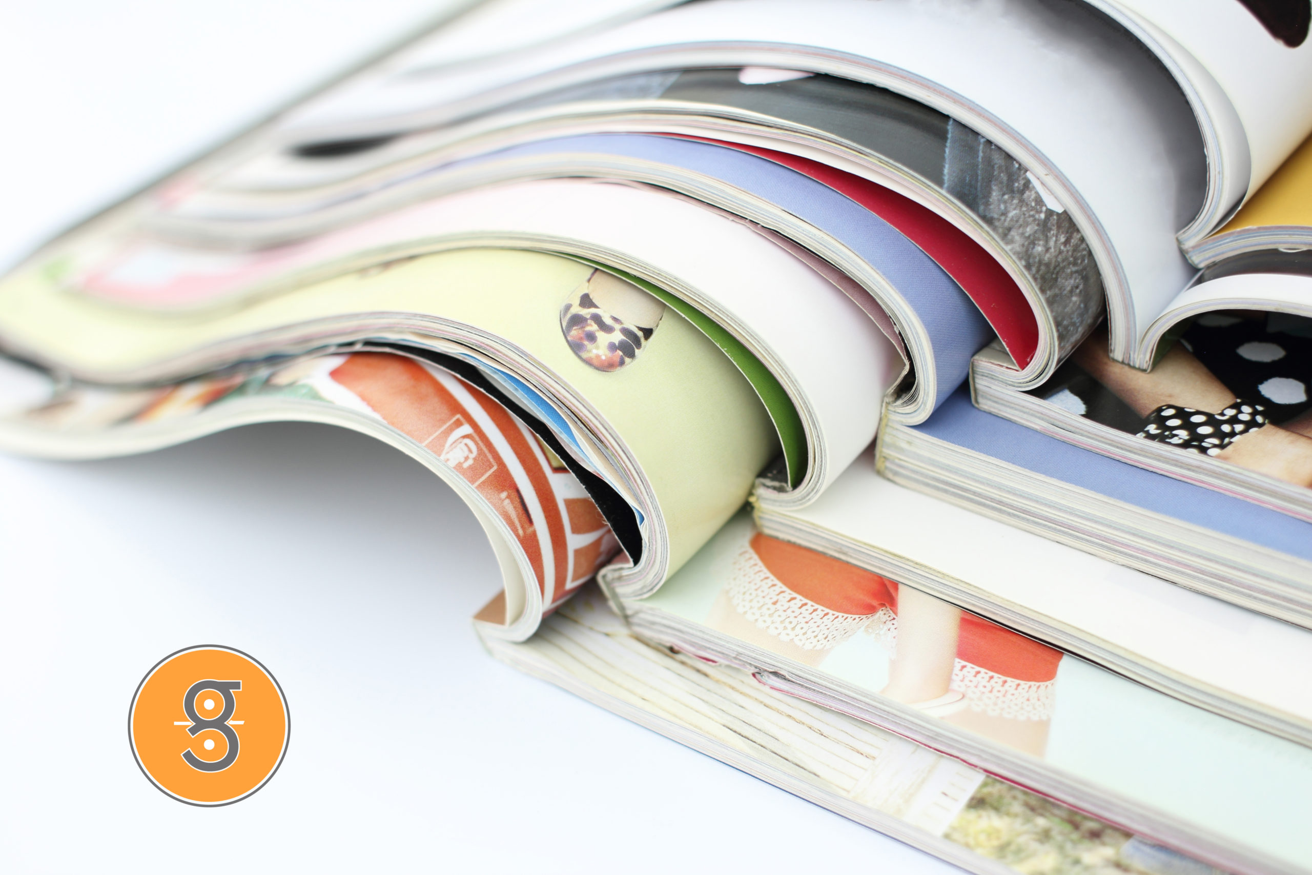 stack of magazines on white background